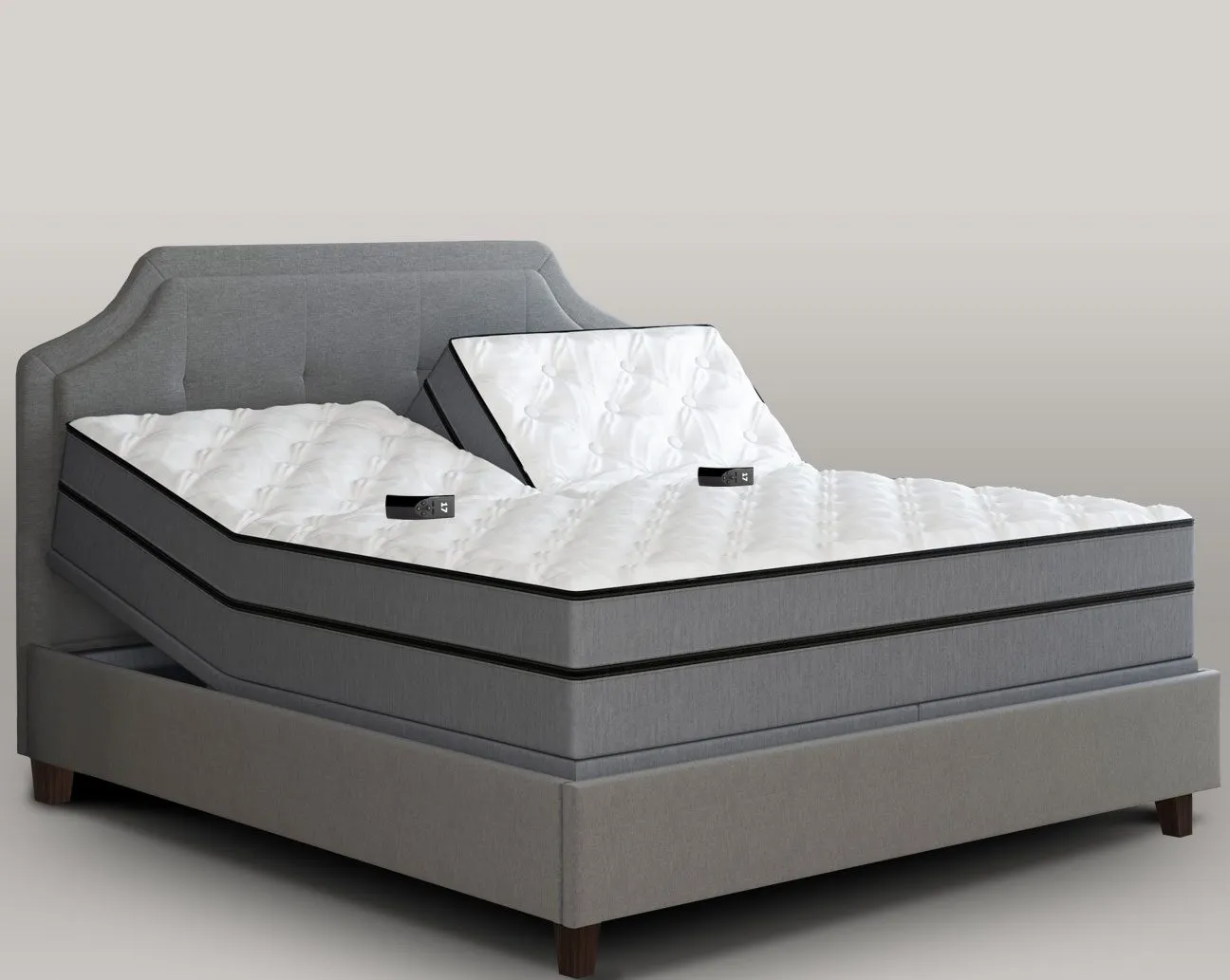 Grandeur Split King Adjustable System showing couple with independent head and foot positioning—one partner with head elevated for sleep apnea relief and other in zero-gravity position for back pain management